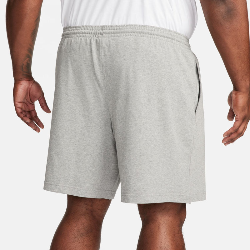 Heather grey knit shorts with elastic waistband and drawstring, relaxed back fit