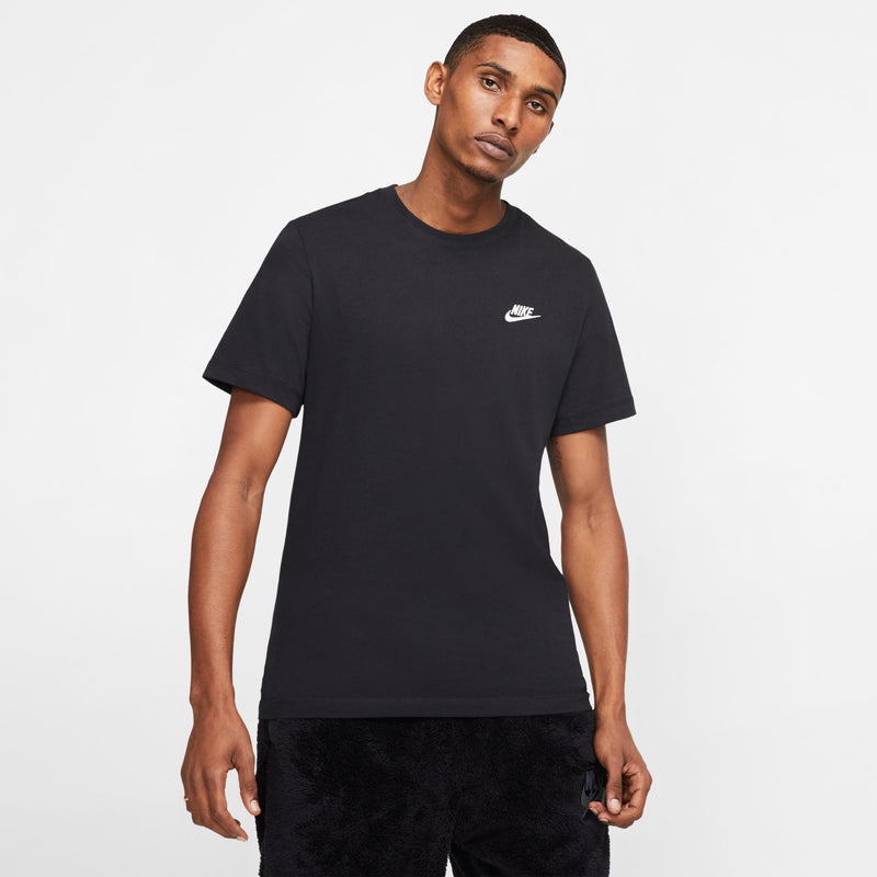 Men's black Nike crewneck T-shirt worn with dark shorts