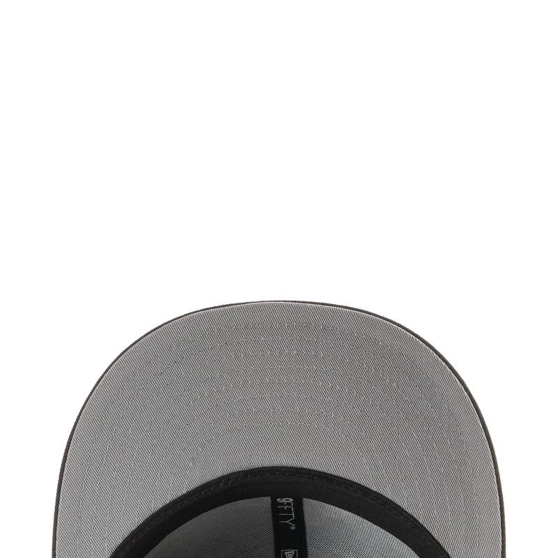 Baseball cap underside with grey lining and black inner brim