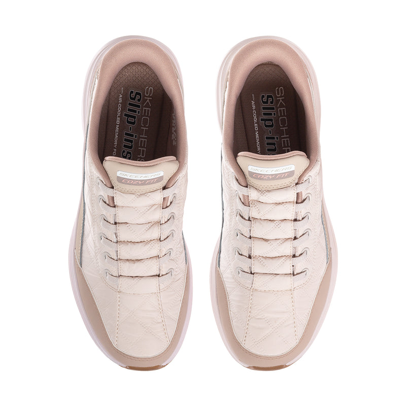 Women's natural sneakers showing padded tongue and dark cushioned insole lining