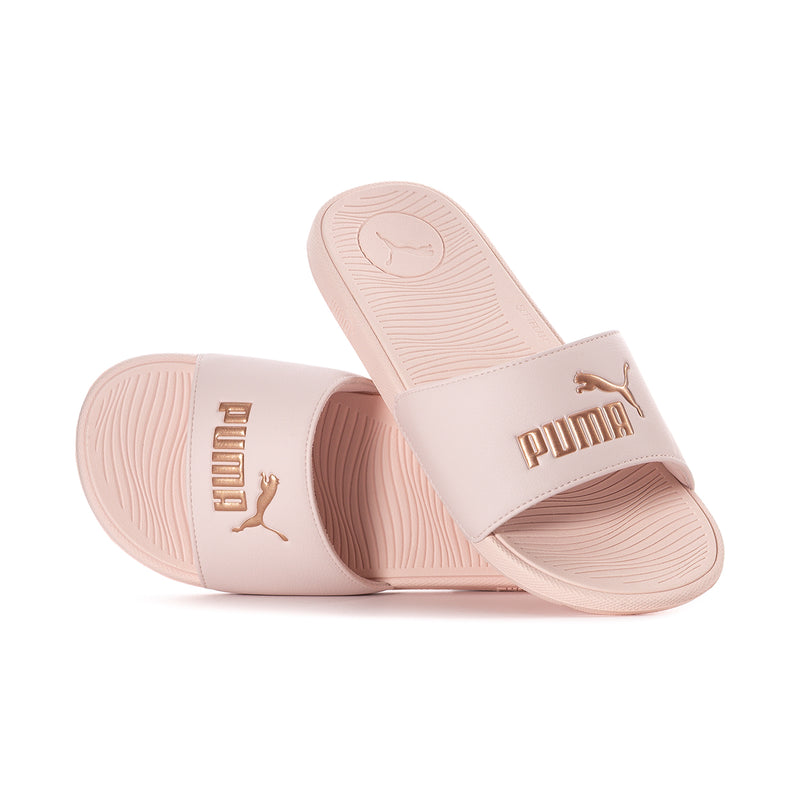 Women's pink slide sandals, footbed and Puma logo on strap