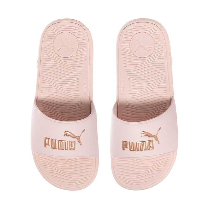 Women's pink slide sandals with Puma logo on the footbed