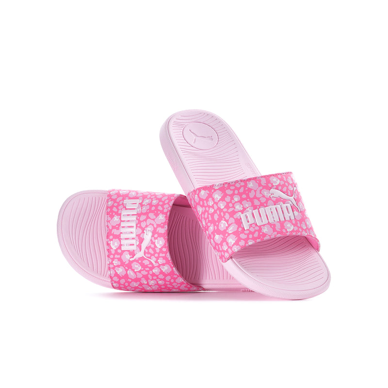 Youth slide sandals with pink graphic strap and molded pink footbed.
