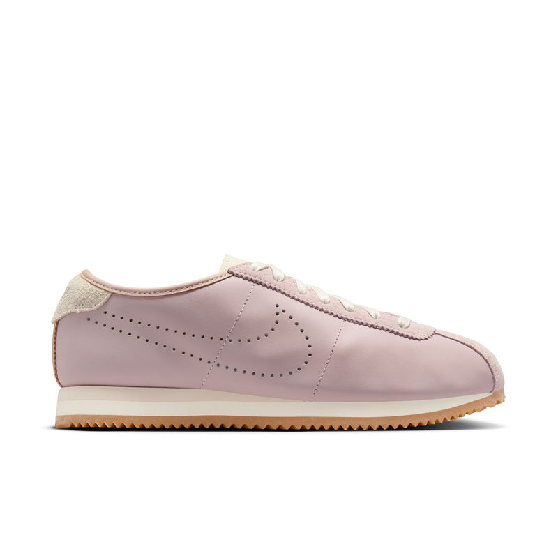 Women's Cortez sneakers side view, particle rose leather with lace-up and swoosh