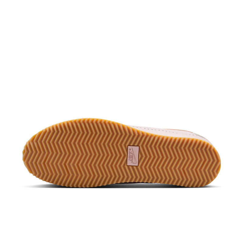 Women's Cortez sneakers outsole view, textured gum tread with brand tag
