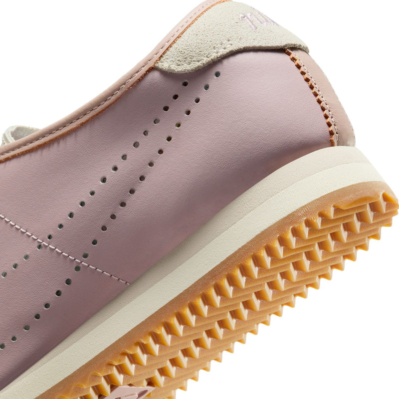 Women's Cortez sneakers side close-up, perforations with gum edge sole