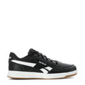 Kids black sneakers with white Reebok stripes and gum sole