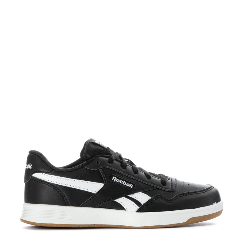 Kids black sneakers with white Reebok stripes and gum sole