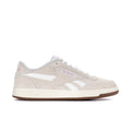 Women’s lace-up sneaker in light beige with white stripes and gum rubber sole