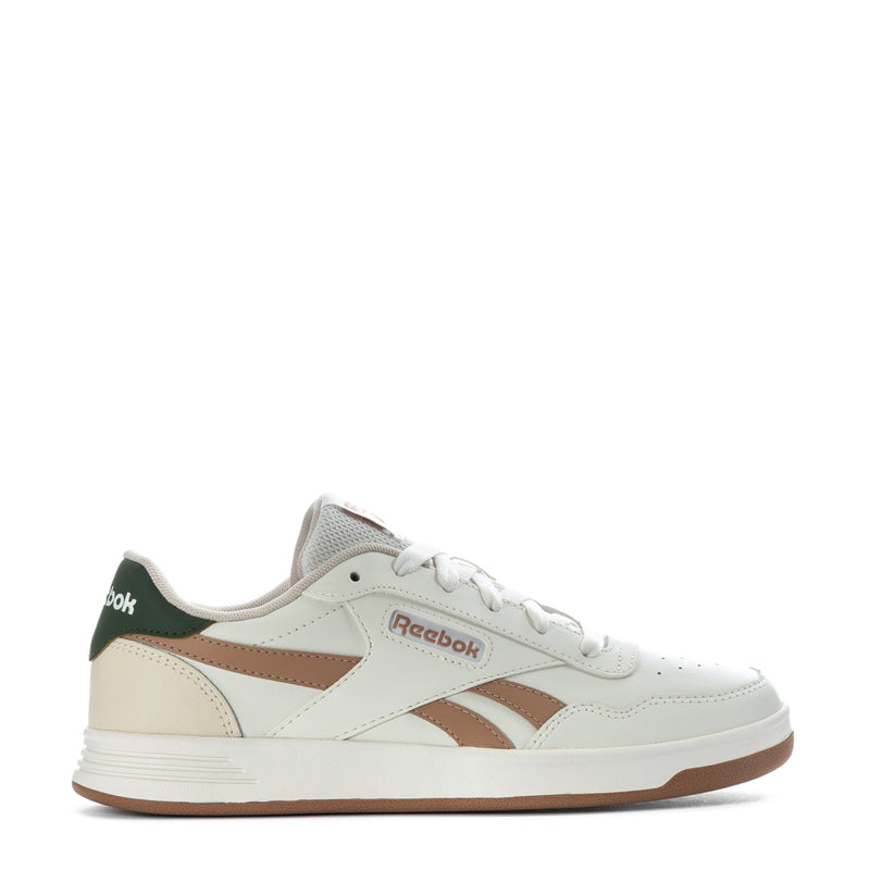 Women’s Reebok low-top sneakers in white with tan and green accents; lace-up.