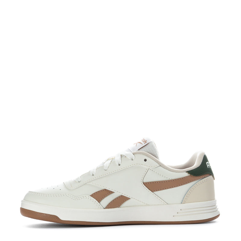 Women’s Reebok low-top sneakers, white uppers with tan stripes and green heel tab; lace-up.