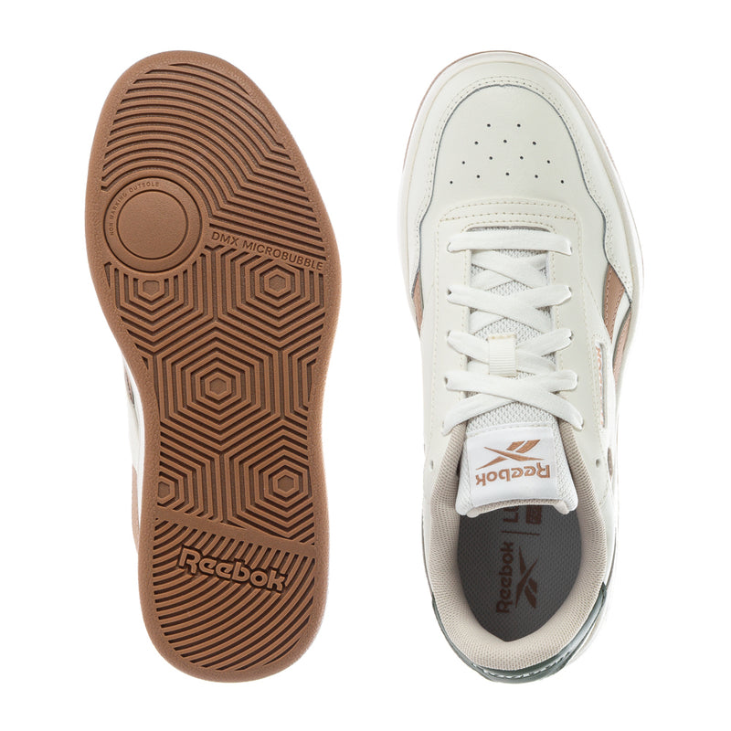 Reebok sneakers outsole and inner side view; white upper with brown gum sole.