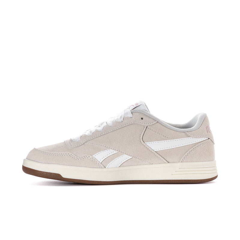 Women’s lace-up sneaker side profile in light beige with white stripes and gum outsole