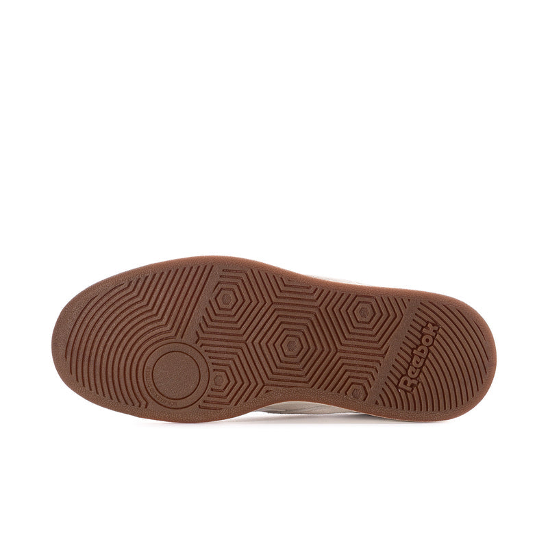 Women’s gum rubber outsole with herringbone traction pattern and Reebok branding