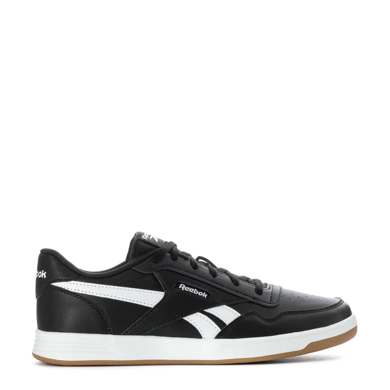 Black youth Reebok Court Advance sneakers with white stripes and gum outsole.