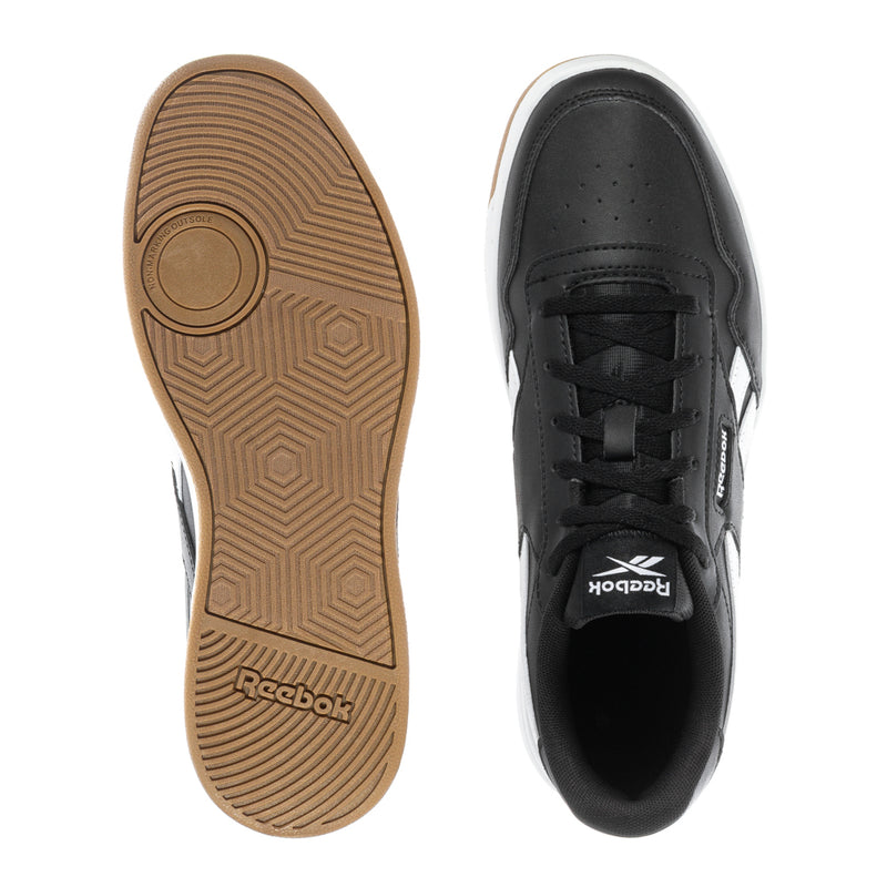 Black youth Reebok Court Advance sneakers shown with gum outsole and black upper toe.