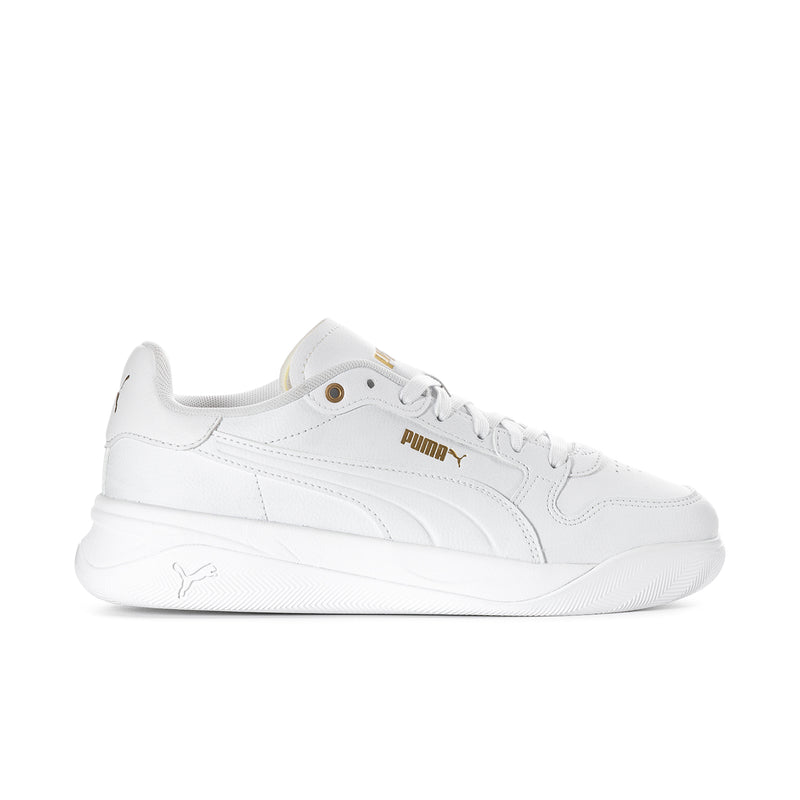 White Puma court sneaker with lace-up design and gold accents
