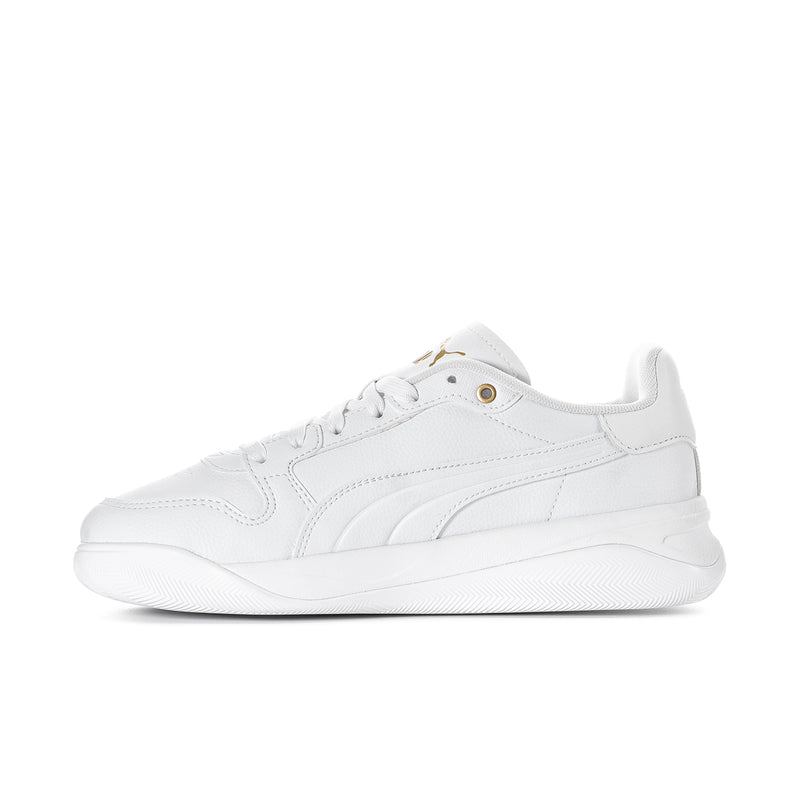 White Puma court sneaker side view with gold eyelets and thick sole