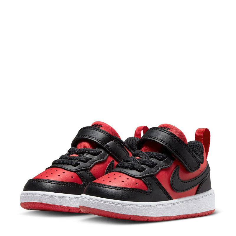 Toddler red, black, and white low-top sneakers with perforated toe and strap