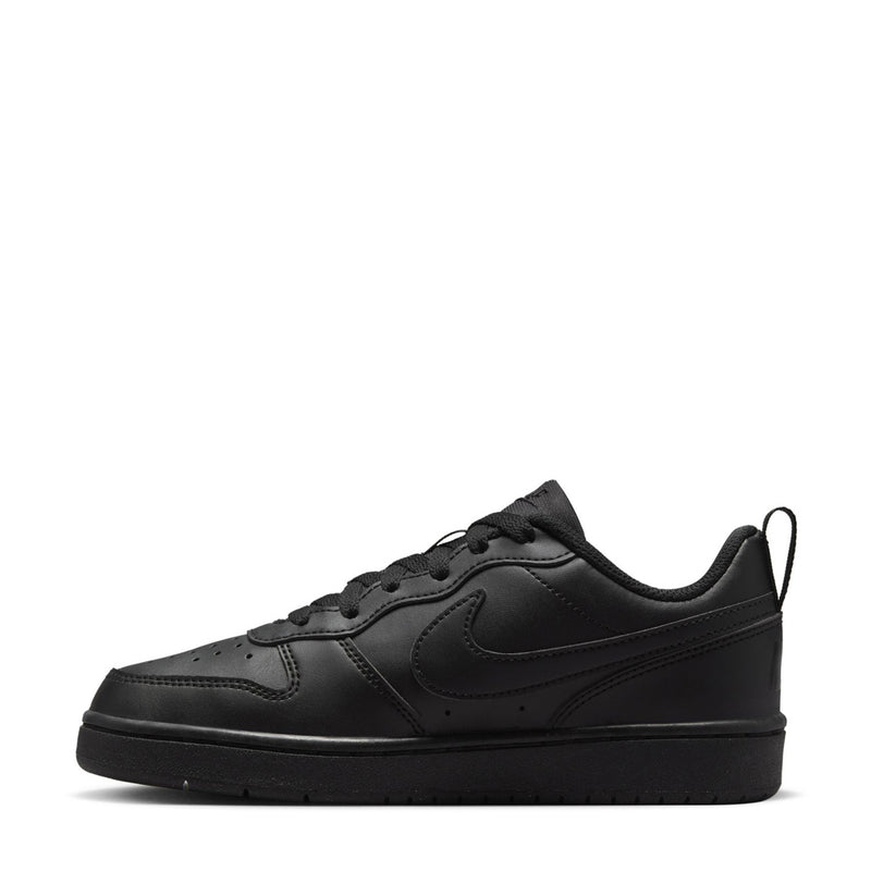 Youth black low-top sneaker, lace-up front with Nike swoosh and perforated toe area.