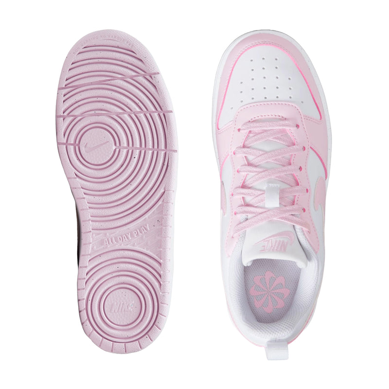 Youth sneaker outsole and inner side view, pink tread with white upper and laces