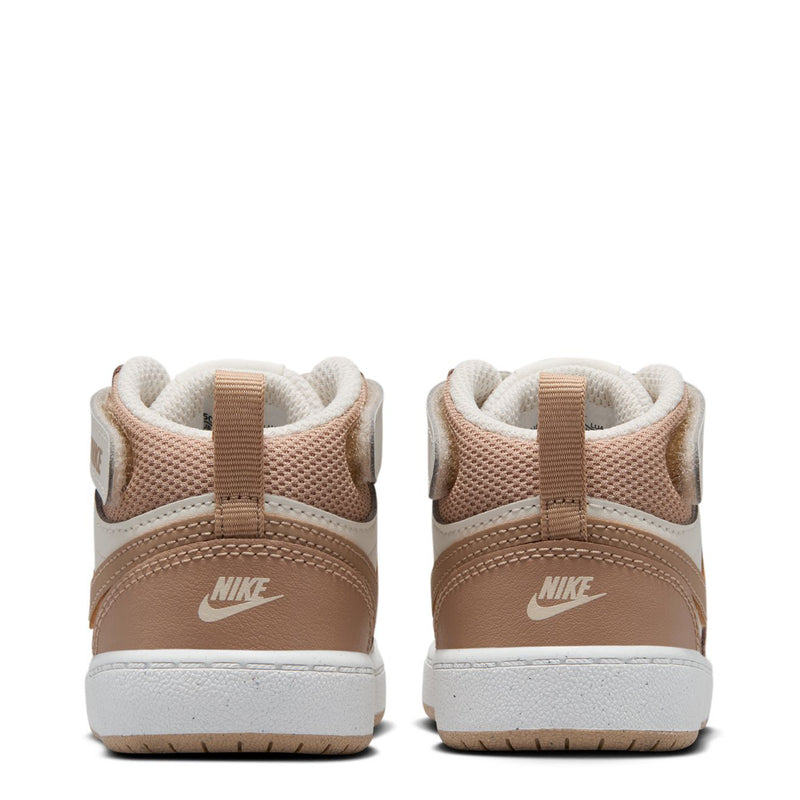 Toddler sneakers heel view, padded collar and tan Nike swoosh on pale ivory