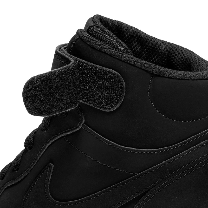 Black youth sneaker upper close-up with hook-and-loop strap and cushioned ankle collar