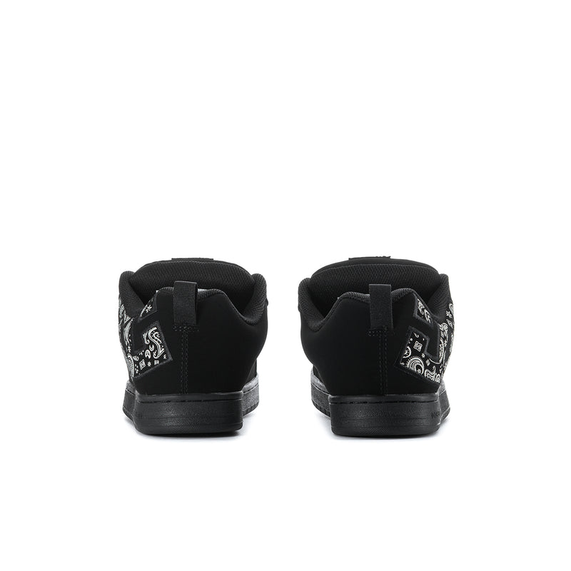 Black low-top sneakers with rear strap tab and lace-up opening.