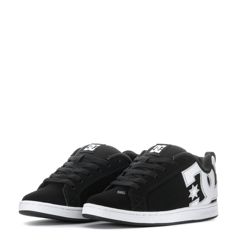 Pair of black women's court sneakers with white side star and DC logo patches