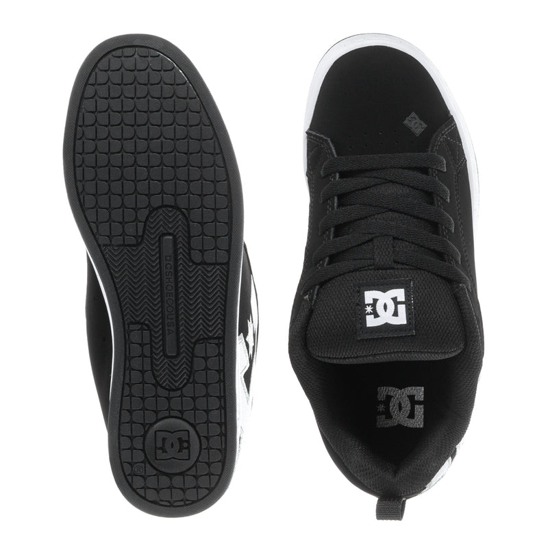 Black women's court sneakers, showing tread outsole and heel logo patch