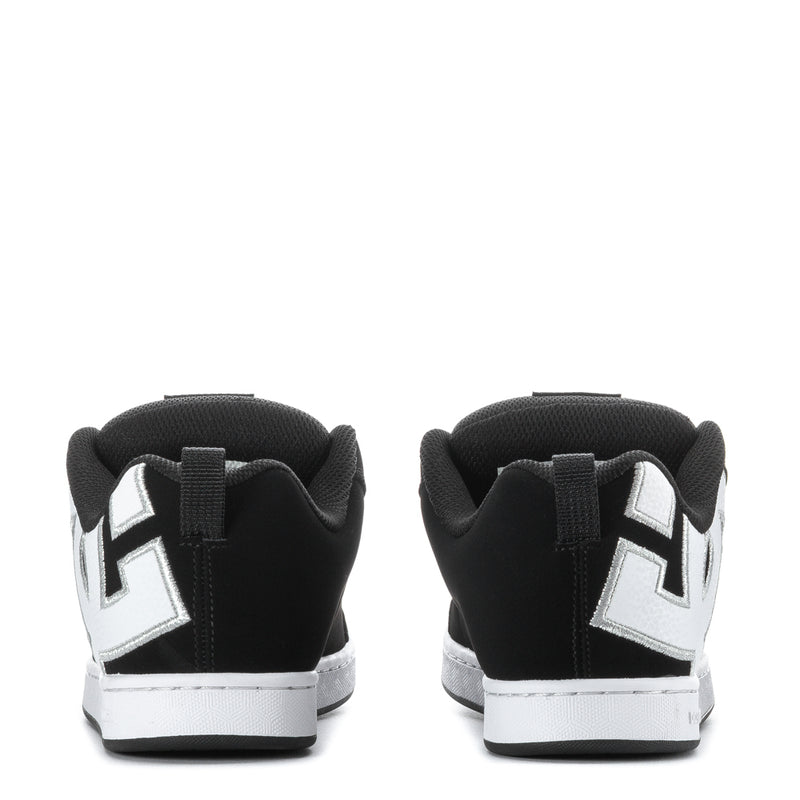 Black women's court sneakers with white heel panels and star graphic