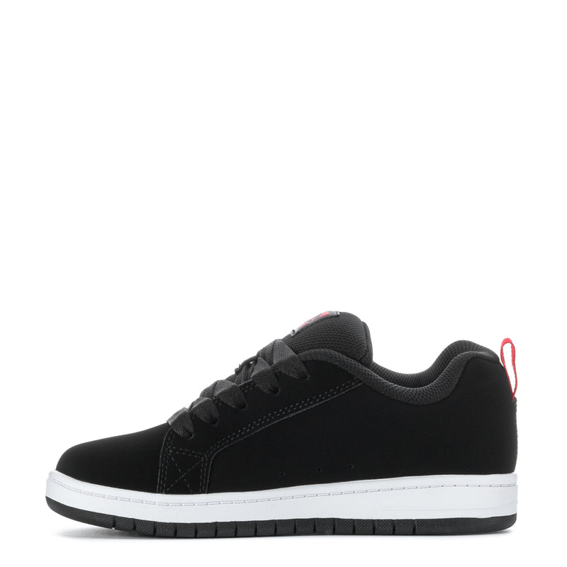 Youth black low-top sneaker, side view with red lace detail and white sole