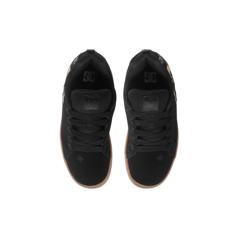 Youth black skate shoes, camo heel panels and textured tread sole
