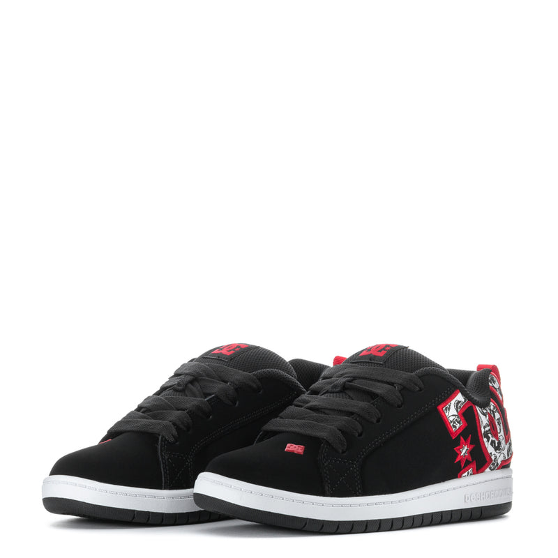 Pair of youth black low-top sneakers with red/white side graphics and black laces