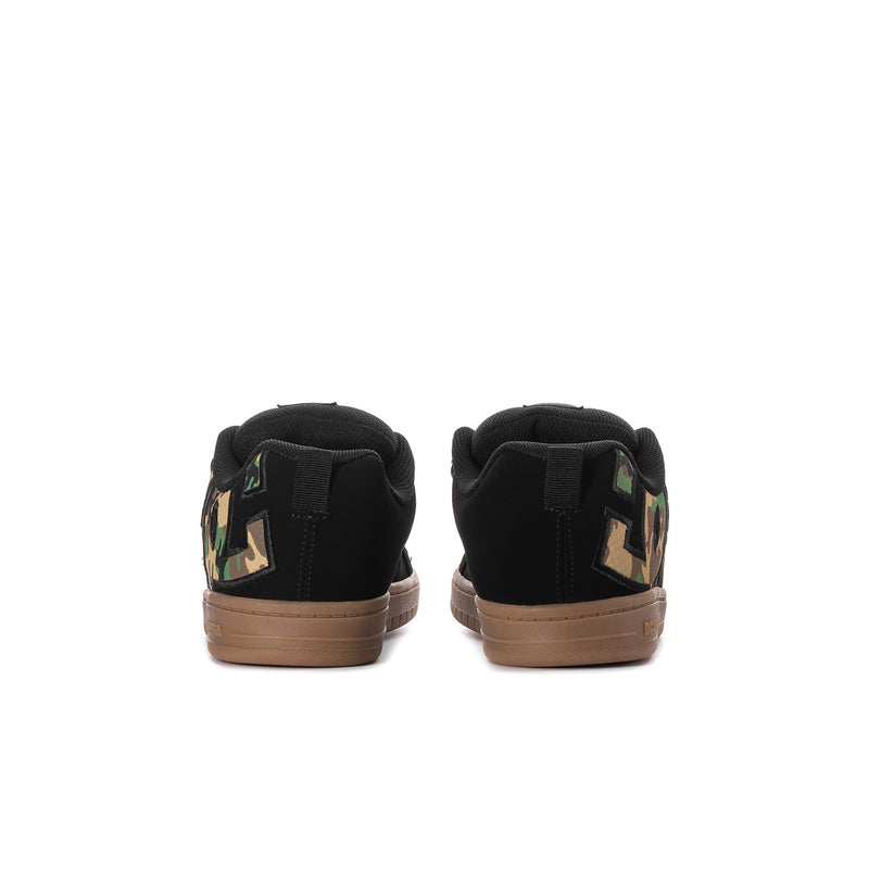 Youth black skate shoes with camo heel tabs and gum rubber heel strip