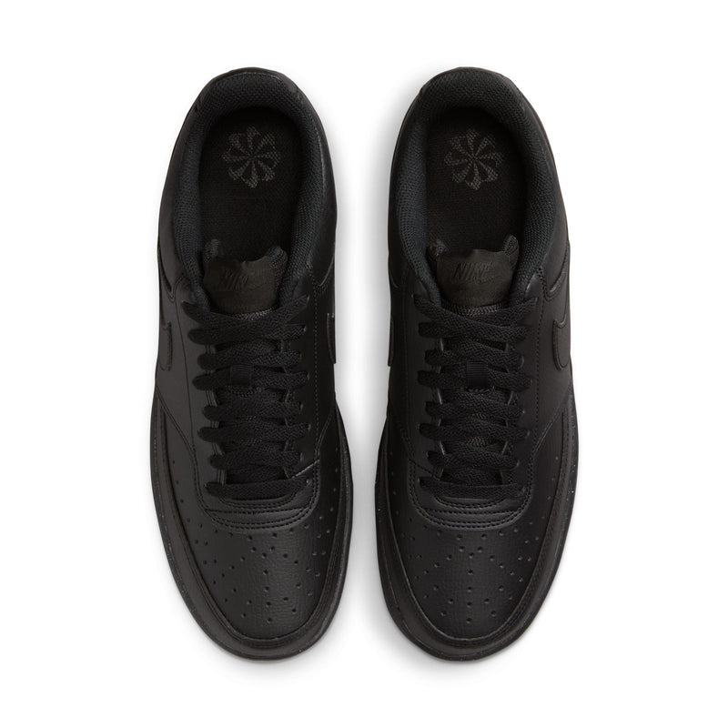 Men's black sneakers showing inner lining and cushioned tongue from above