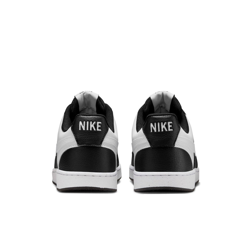 Men's low-top sneakers, black and white, rear view with Nike label and heel tab.