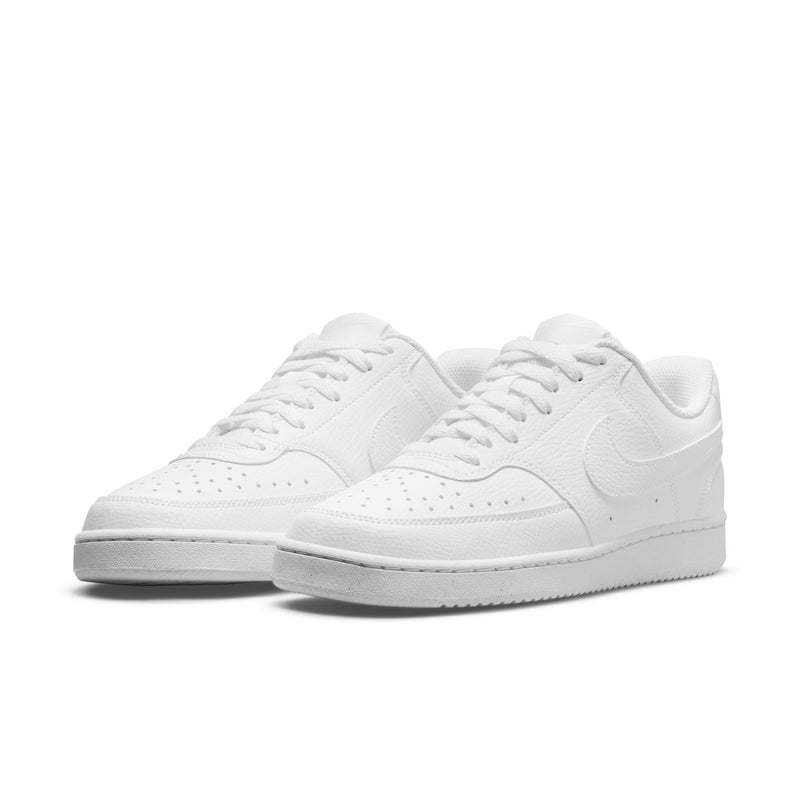 White low-top sneaker pair with lace-up design and padded collars