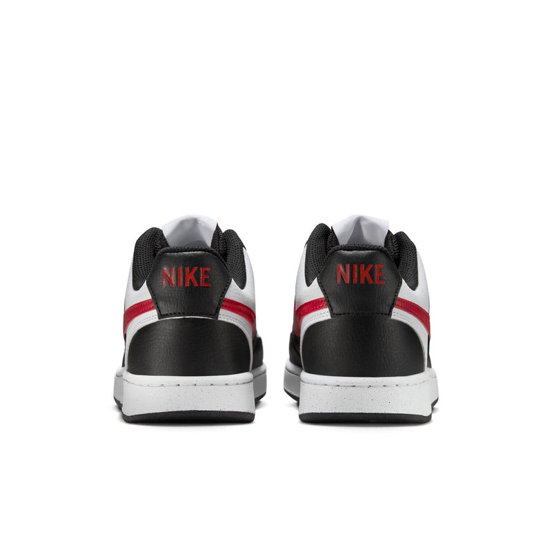 Women's low-top sneakers with Nike logo on heel, black with white and red accents.