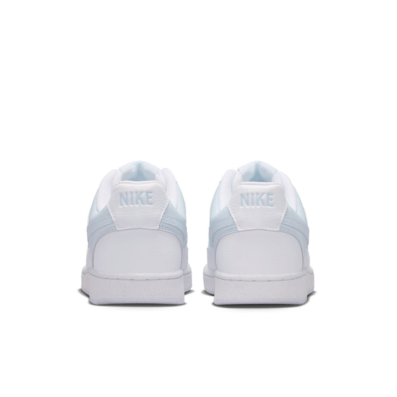 Women's white low-top sneakers, back view with Nike branding on heel.