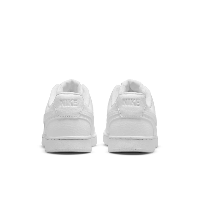 White sneakers rear view with Nike branding on heel tabs