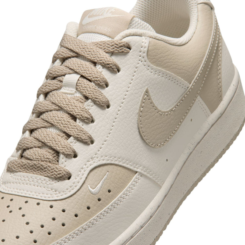 Cream leather-look sneaker upper with beige lace-up, Swoosh, and stitching