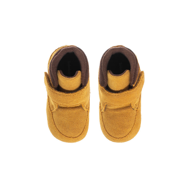 Infant wheat booties front view with dark brown interior and hook-strap