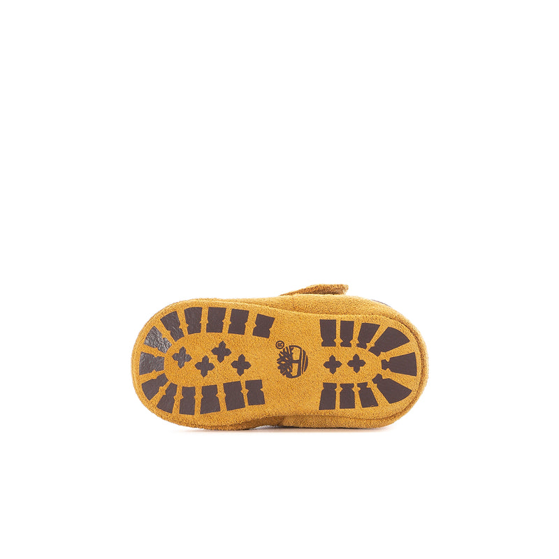 Infant wheat bootie outsole with textured pattern and dark border