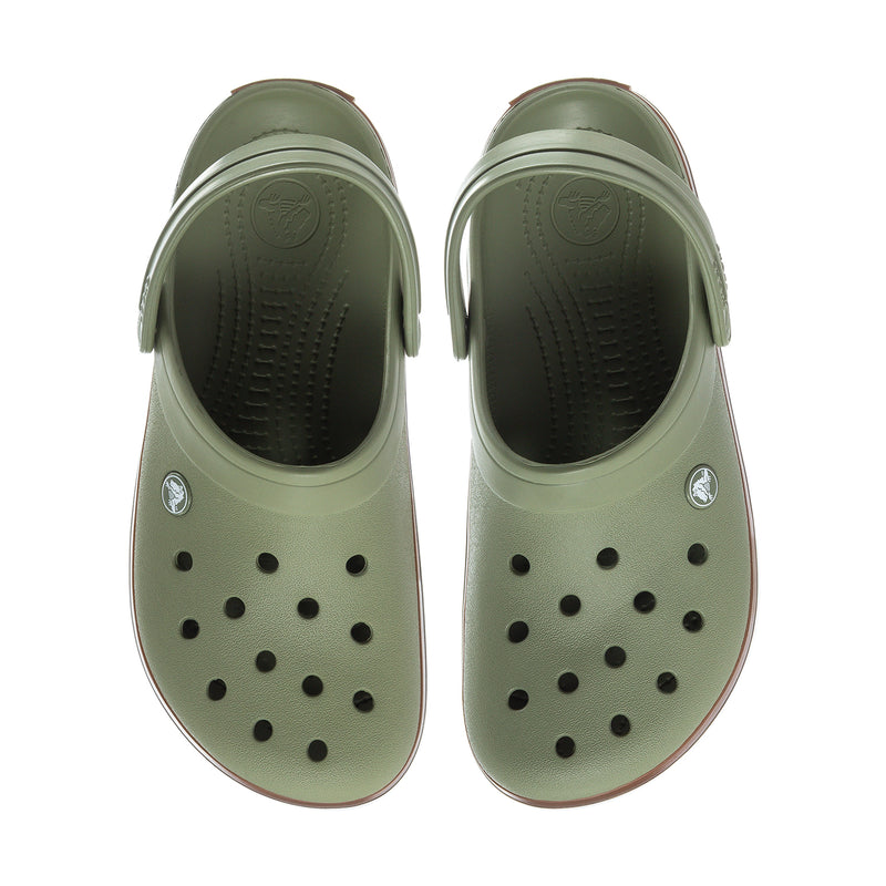 Pair of olive green Crocband clogs with circular vent holes and molded upper