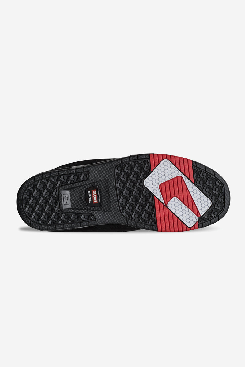 Outsole view of CT-4 Black Suede skate shoe with tread pattern and red details