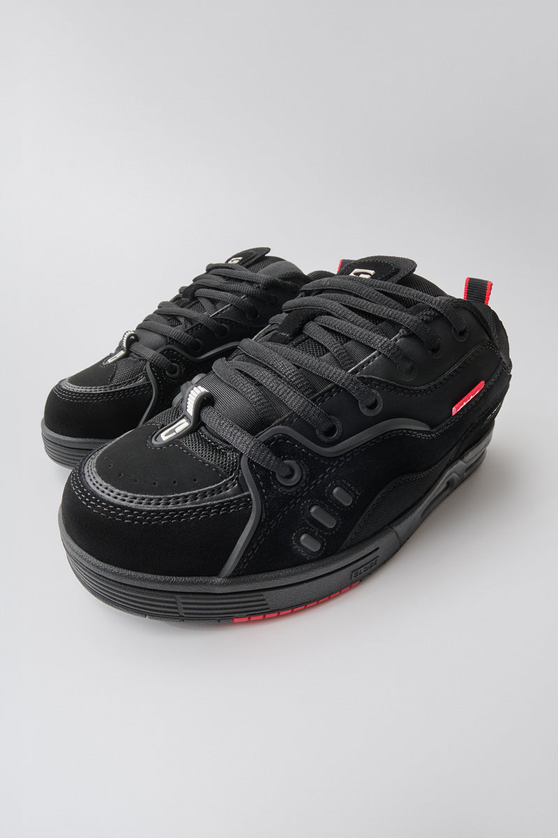 CT-4 Black Suede skate shoes in a close-up angled view showing laces and a red heel pull tab