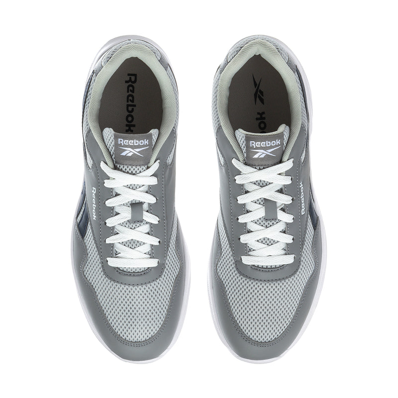Reebok grey sneakers, front view with white laces and textured mesh tongue
