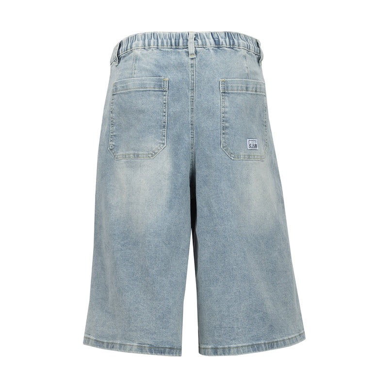 Light blue denim jorts with elastic waistband and two back patch pockets
