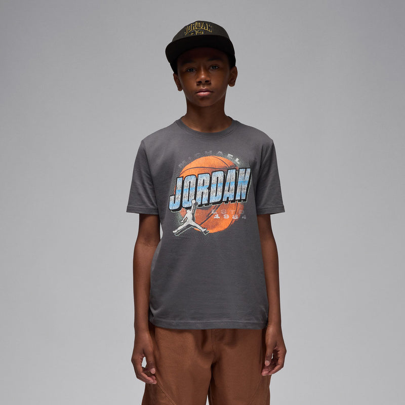 Iron grey youth Jordan T-shirt with front graphic, worn by a teen model